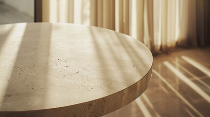 Wall Mural - Beautiful beige round table close-up in light beige colors and sunlight coming in for background