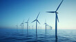 © TS Armin - A row of wind turbines rises from the ocean, harnessing renewable energy in a serene offshore setting, symbolizing sustainable innovation and the power of nature.