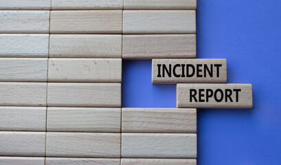 Incident Report symbol. Concept word Incident Report on wooden blocks. Beautiful purple background. Business and Incident Report concept. Copy space