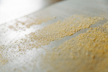 Sawdust covering workbench in woodworking workshop