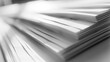 © Shozib - Stack of blank white paper is creating an abstract background with its edges and shadows