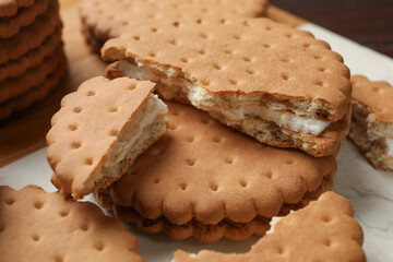 Wall Mural - Fresh tasty sandwich cookies on table, closeup