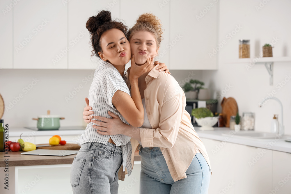 Young woman having fun in kitchen