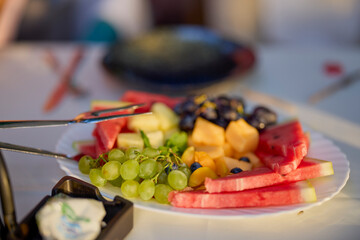 a plate of fresh fruit ready to serve