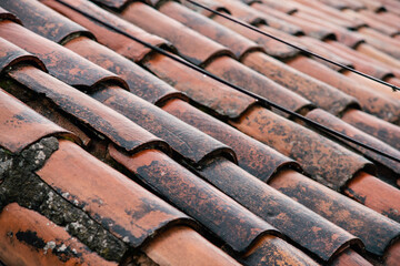 weathered wet roof tiles