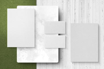 Letter Paper and Business Card Mockup On White Wood and Grassy Field Texture