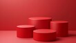 © Aris Suwanmalee - Four red cylindrical podiums on a red background. Minimalist design for product display or presentation.