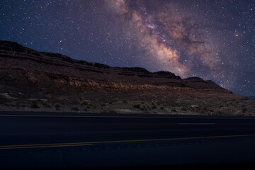Wall Mural - View from road trip with Milky way over the top of mountain