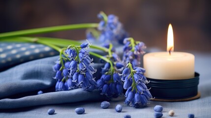 Wall Mural - Candle and muscari flowers on linen cloth