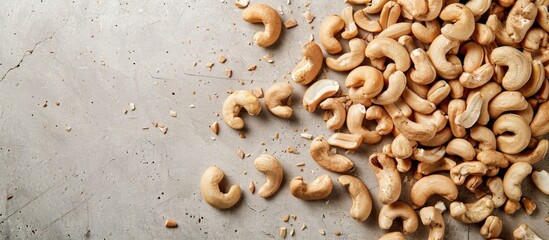 Poster - Cashew nuts scattered on the floor with a copy space image