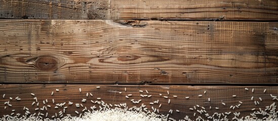 Aufkleber - Close up shot of rice arranged on wooden floor panels with copy space image