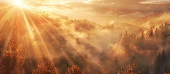 Wall Mural - Cloudy autumn sunrise with sun rays filtering through creating a picturesque backdrop suitable for a copy space image