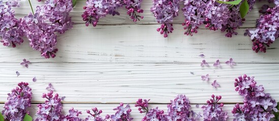 Aufkleber - Top down view of lilac flowers set against a white wooden backdrop with ample space for text or graphics copy space image