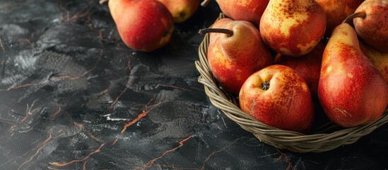 Leinwandbilder - Basket filled with pears fresh summer fruits with copy space image