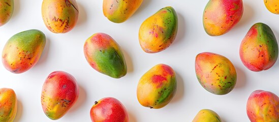 Poster - Copies of mangos displayed on a white background for copy space image