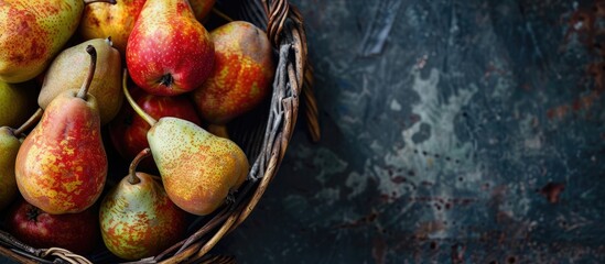 Leinwandbilder - Basket filled with pears fresh summer fruits with copy space image