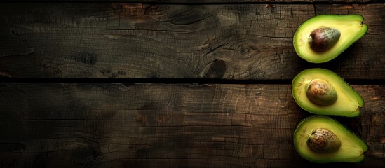 Aufkleber - Avocado fruit displayed on a wooden surface with copy space image