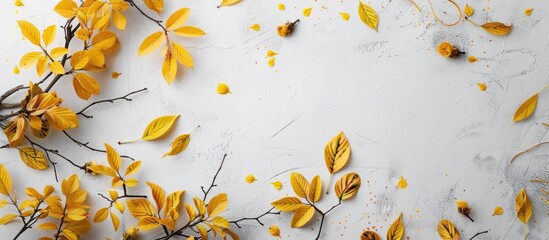 Sticker - Top down view of a minimalist autumn arrangement with fallen yellow leaves and branches providing copy space in the image