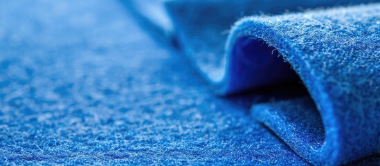 Leinwandbilder - Close up view of blue felt material with copy space image