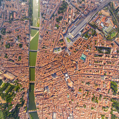 Wall Mural - Florence, Italy. General view of the city on a sunny day. Arno River. Aerial view