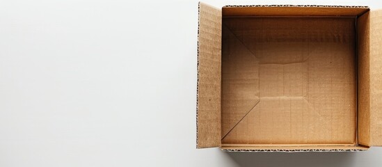 Poster - A cardboard box on a white background ideal for design presentations with copy space image