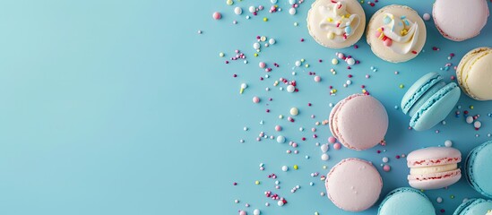 Poster - Colorful unicorn blue macaron dessert cake on a blue pastel background conveying a minimal bakery concept with a top view showcasing copy space image
