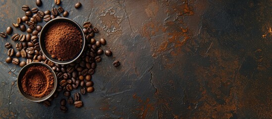 Aufkleber - Top view of a coffee cup beans and ground powder on a stone background with copy space image