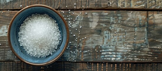 Aufkleber - Close up of granulated sugar in a bowl on a wooden table providing copy space image