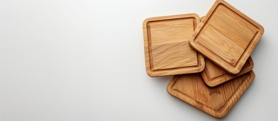 Poster - Coasters placed on a white backdrop with copy space image