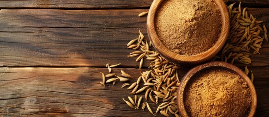 Fototapete - Caraway powder and seeds from Persia displayed on a wooden table with room for text in the image. Creative banner. Copyspace image
