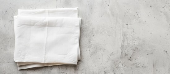 Leinwandbilder - Arrange white napkins on a blank background for a copy space image