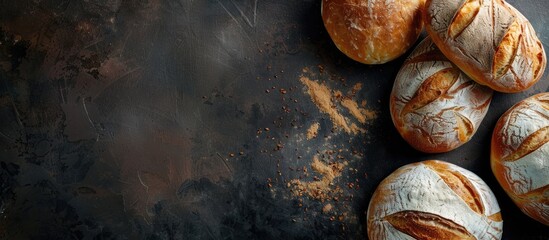 Poster - Bread on a dark backdrop with ample copy space image