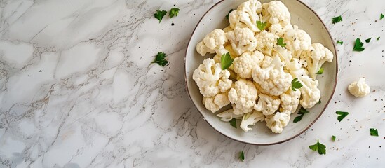 Poster - Close up of cauliflower on a plate with designated copy space image