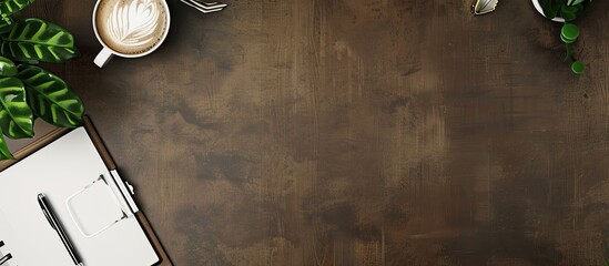 Poster - Top down view of an office desk with supplies a coffee cup and ample copy space image for text
