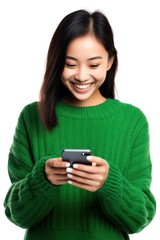 Wall Mural - Smiling woman using smartphone