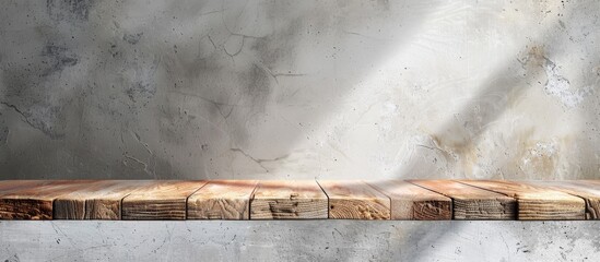 Poster - A brown marble sample stone is displayed on a wooden table with a white concrete block background providing copy space image