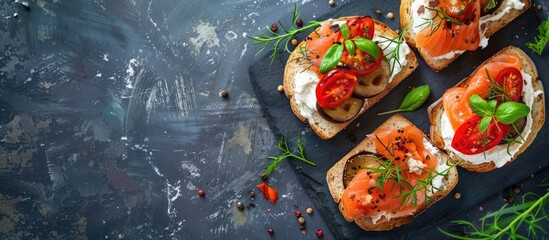 Aufkleber - A display of healthy open sandwiches featuring salted salmon sun dried tomato grilled aubergine Bulgarian pepper and cream cheese on a stone table ideal for vegetarians Top view with copy space image