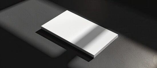 Fototapete - A business card with shadows adding depth to a copy space image