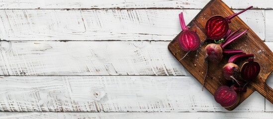 Poster - Beetroot on a cutting board against a white wood background with space for text or image. Creative banner. Copyspace image