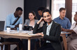 © HockleyM2/peopleimages.com - Businesswoman, portrait or smile in meeting for confidence, teamwork or collaboration in office. Planning, happy and proud female worker for feedback, paperwork and startup project for development