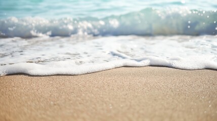 sea shore wave and sand with summer sun. summer beach background with copy space. sea water coastlin