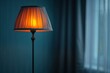 © aicandy - A warmly lit lamp with an elegant orange shade stands against a dark interior background, casting a soft glow that creates a soothing and calming ambiance in the room