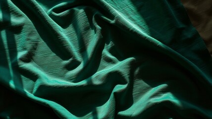 Poster - Abstract background wallpaper. Dark green fabric, with texture and softness against an isolated background. Folds in the fabric or subtle wrinkles to emphasize its quality material.