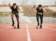 © Fanti/peopleimages.com - Race, start and men running on track for speed challenge, marathon event and professional sports at arena. Action, go and people at stadium for competition, fitness and fast athlete runner in sprint