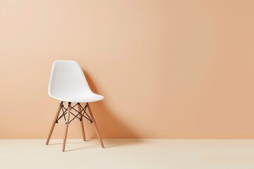 A white plastic chair with wooden legs and black webbing sits in front of a peach wall. Generative AI