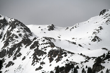 Beautiful mountain landscape of snowy spring mountains