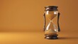 © Aris Suwanmalee - A classic hourglass with sand slowly trickling through the glass, symbolizing time and its passage.