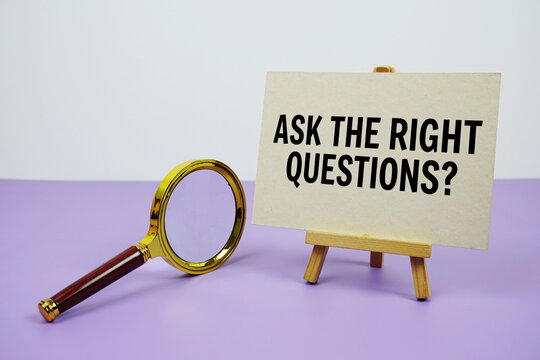 Ask the right questions? text with magnifying glass on purple background