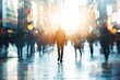 © Igor - A businessman walk on road through blurred people and city and town
