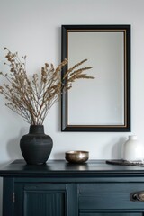 Poster - A classic black dresser with a mirror and a vase on top, perfect for home decor or furniture photography